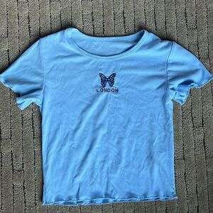 London butterfly embroidered blue frilly tshirt from Bradley Michelle